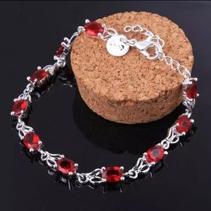 925 sterling silver bracelet /garnet stones